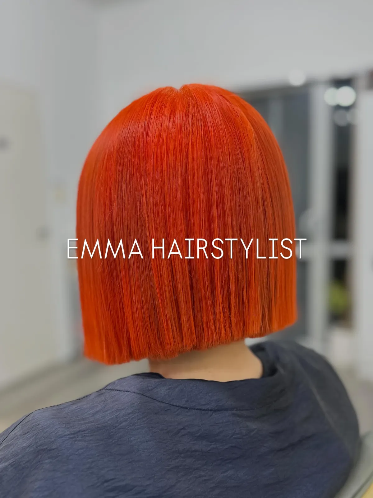 A glossy bright-copper blunt bob, coloured and cut at Emma Hair Stylist